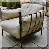 L03b. 4 Curved metal patio chairs with beige cushions. 